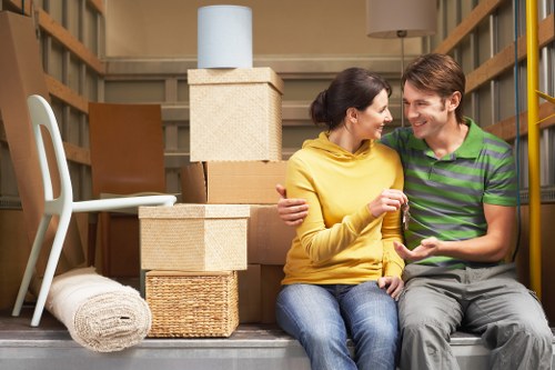 Careful packing of fragile items by experts in Manwithvan E8